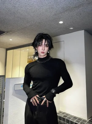 Black beaded collar shimmer rib knit turtleneck streetwear top front full body styling with wide leg black trousers