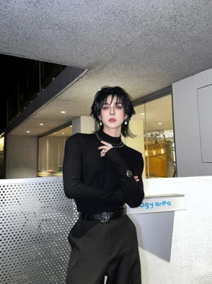 Black beaded collar shimmer rib knit turtleneck top three quarter view in elevated Seoul streetwear outfit