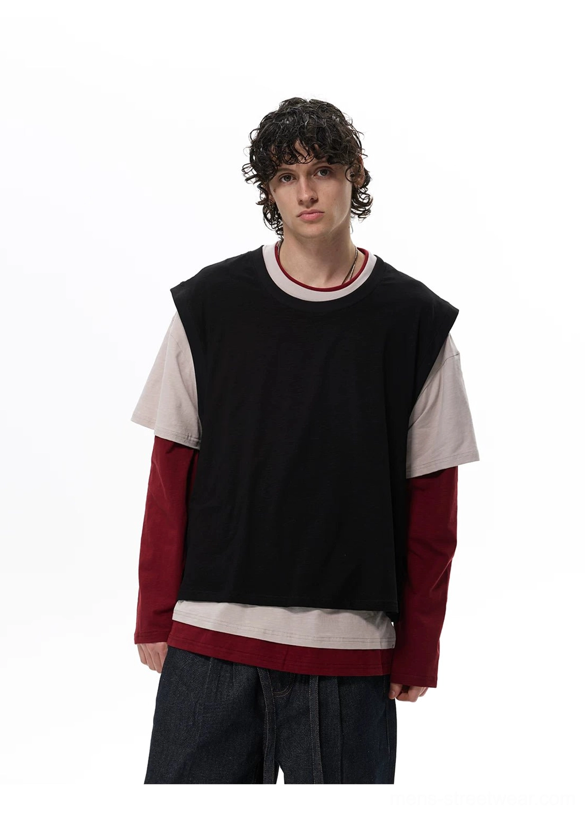 Front close-up of a black beige and burgundy two-tone layered vest tee top with a relaxed crew neck streetwear silhouette
