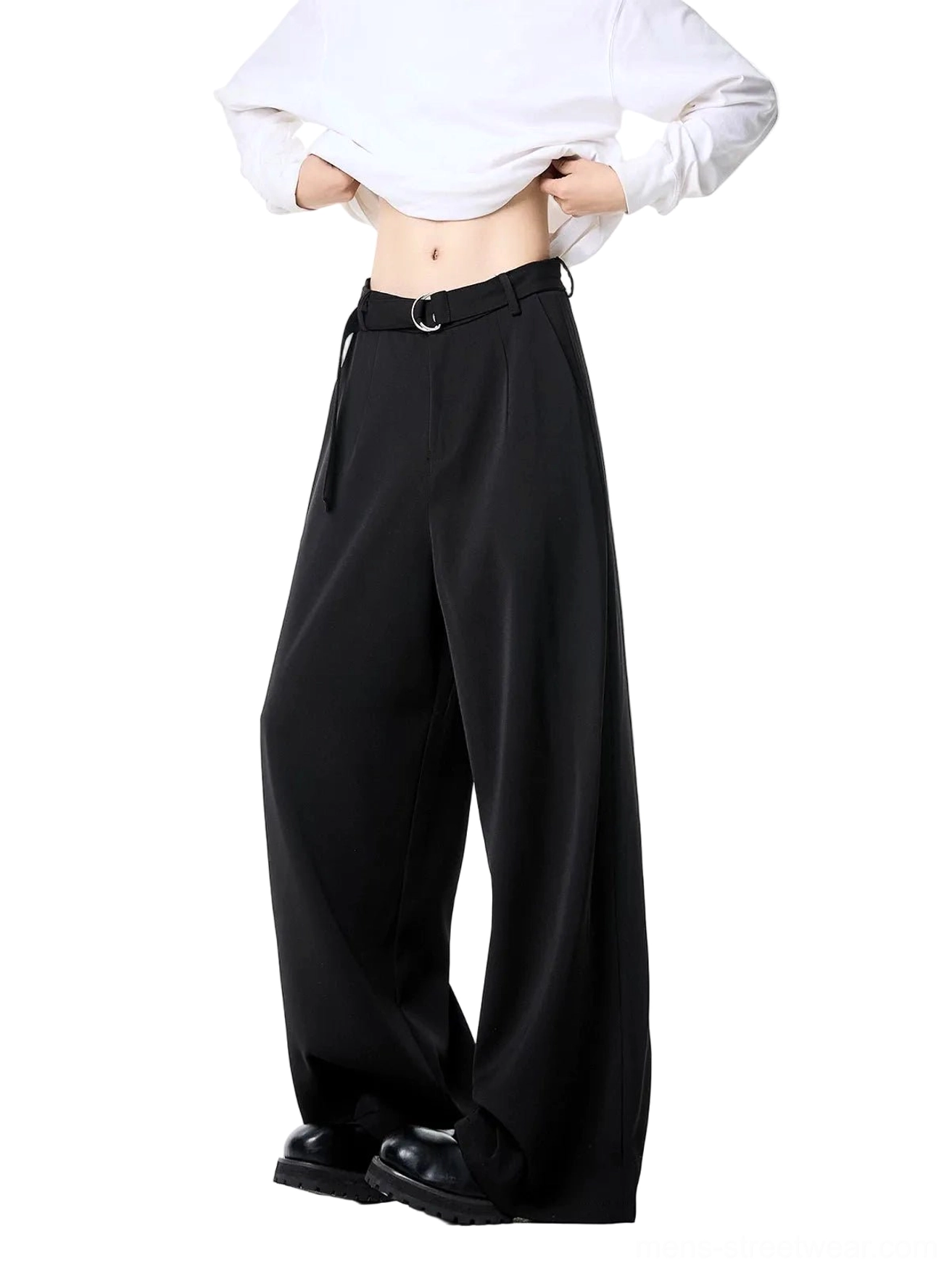 Black high-waist belted wide-leg streetwear trousers side view with smooth draped fabric and circular metal buckle detail