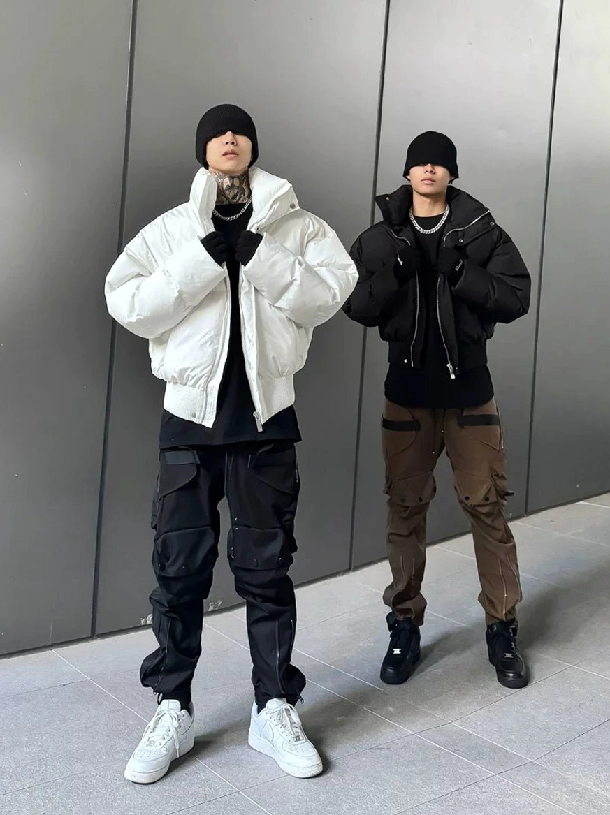 Streetwear cargo jogger outfit comparison showing black and brown tactical utility pants with puffer jackets
