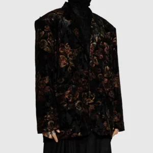 Black floral velvet oversized blazer left side three quarter view showing relaxed single breasted tailoring