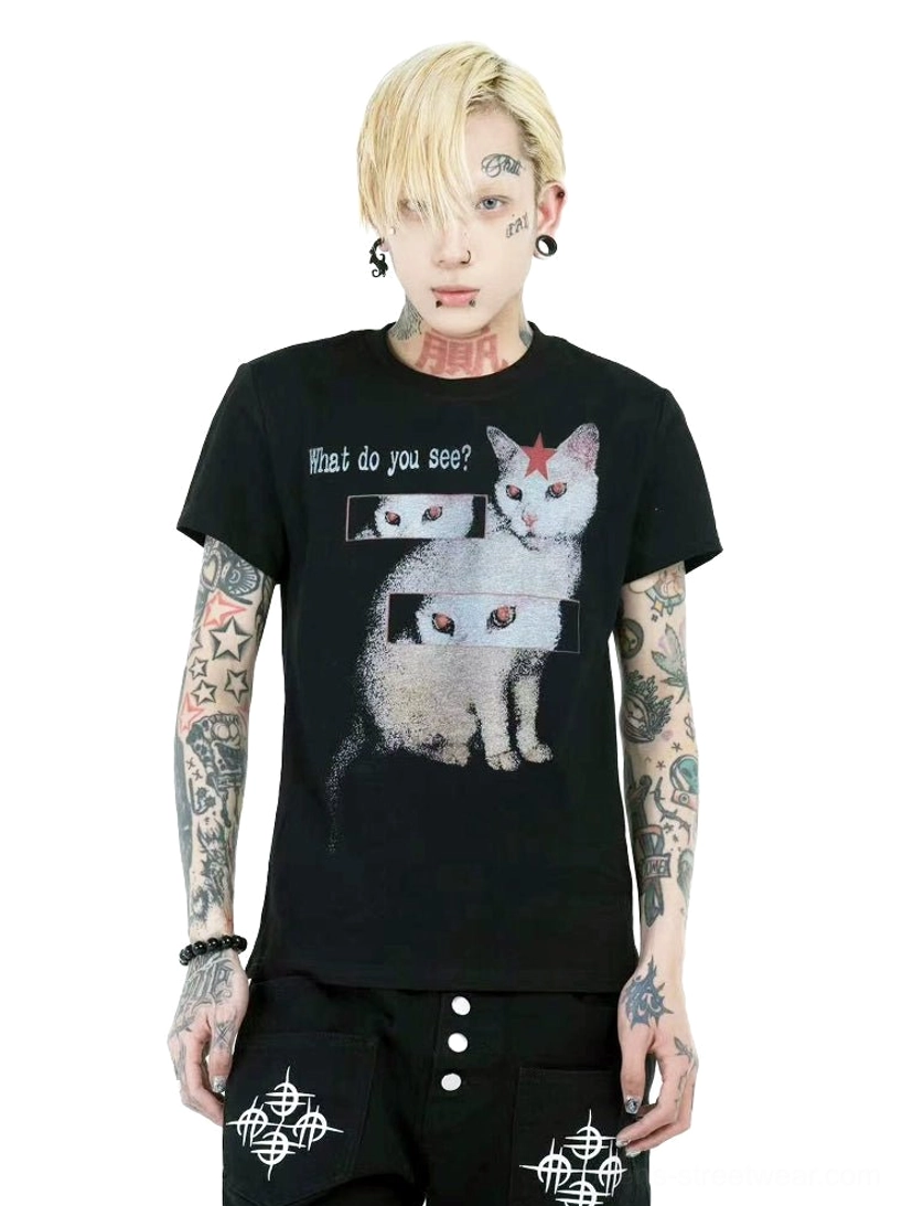Close-up front view of black crew-neck T-shirt featuring white cat optical illusion artwork repeated eye panels and What do you see streetwear slogan