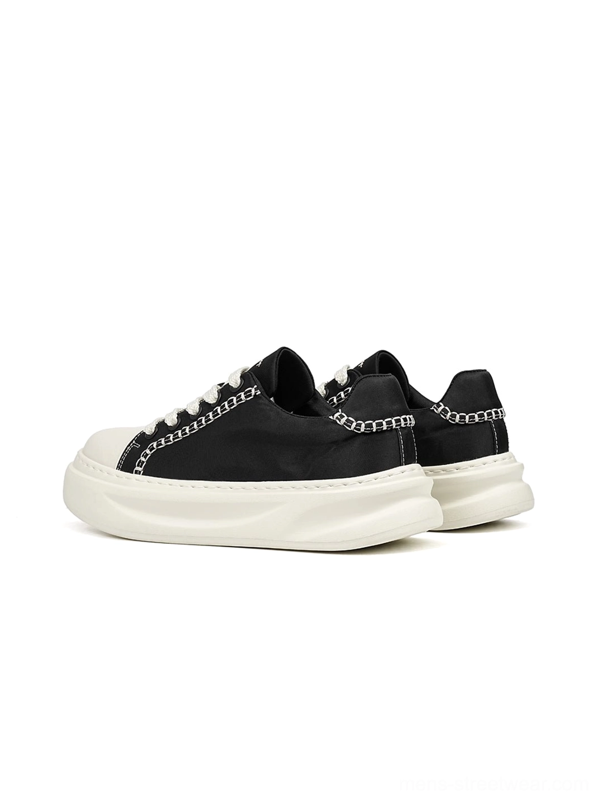 Black chain-trim platform sneakers with contrast stitching and chunky rubber sole, detailed product view for Korean streetwear styling