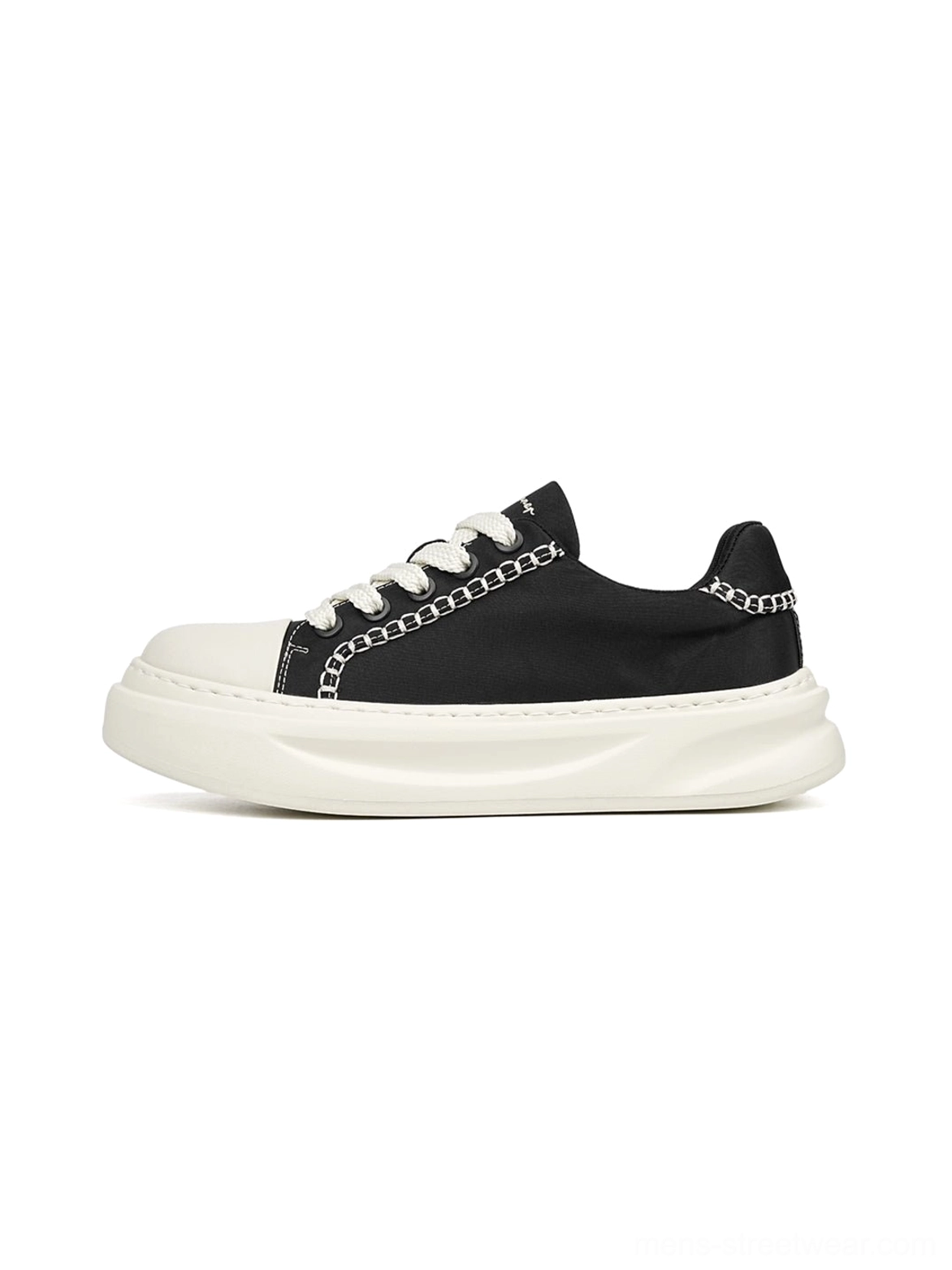 Black chain-trim platform sneakers with white contrast stitching, white toe cap, laces, and thick off-white rubber sole shown from a left front angle