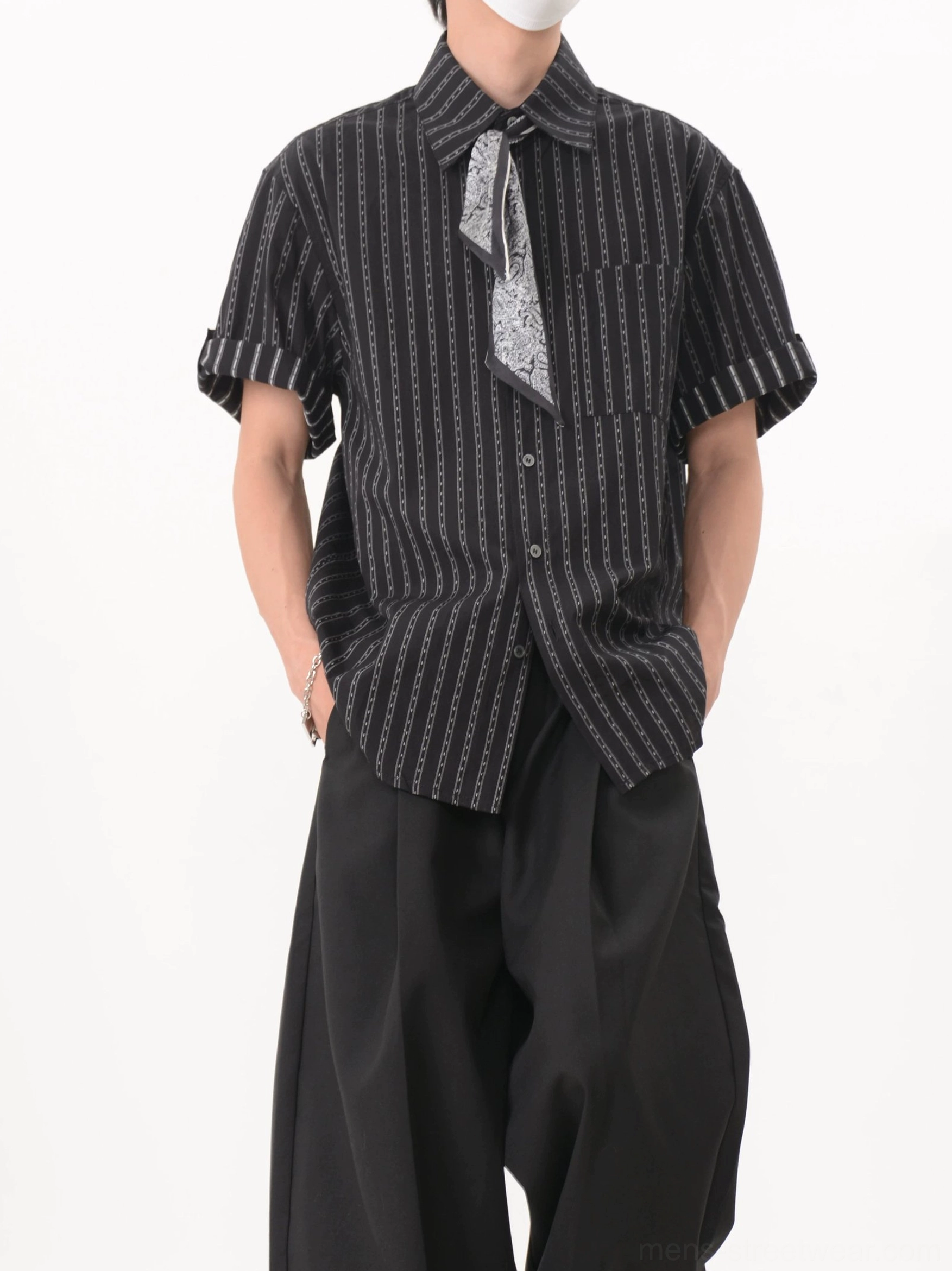 Black chainstripe streetwear shirt with detachable scarf, asymmetric hem, button placket, and relaxed men's styling