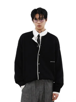 Black contrast trim knit cardigan styled with white shirt tie and plaid wide-leg trousers in Seoul streetwear outfit