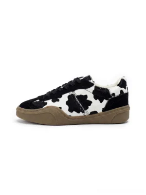 Black cow print horsehair leather low-top sneakers with black suede toe cap and tan gum rubber sole side view