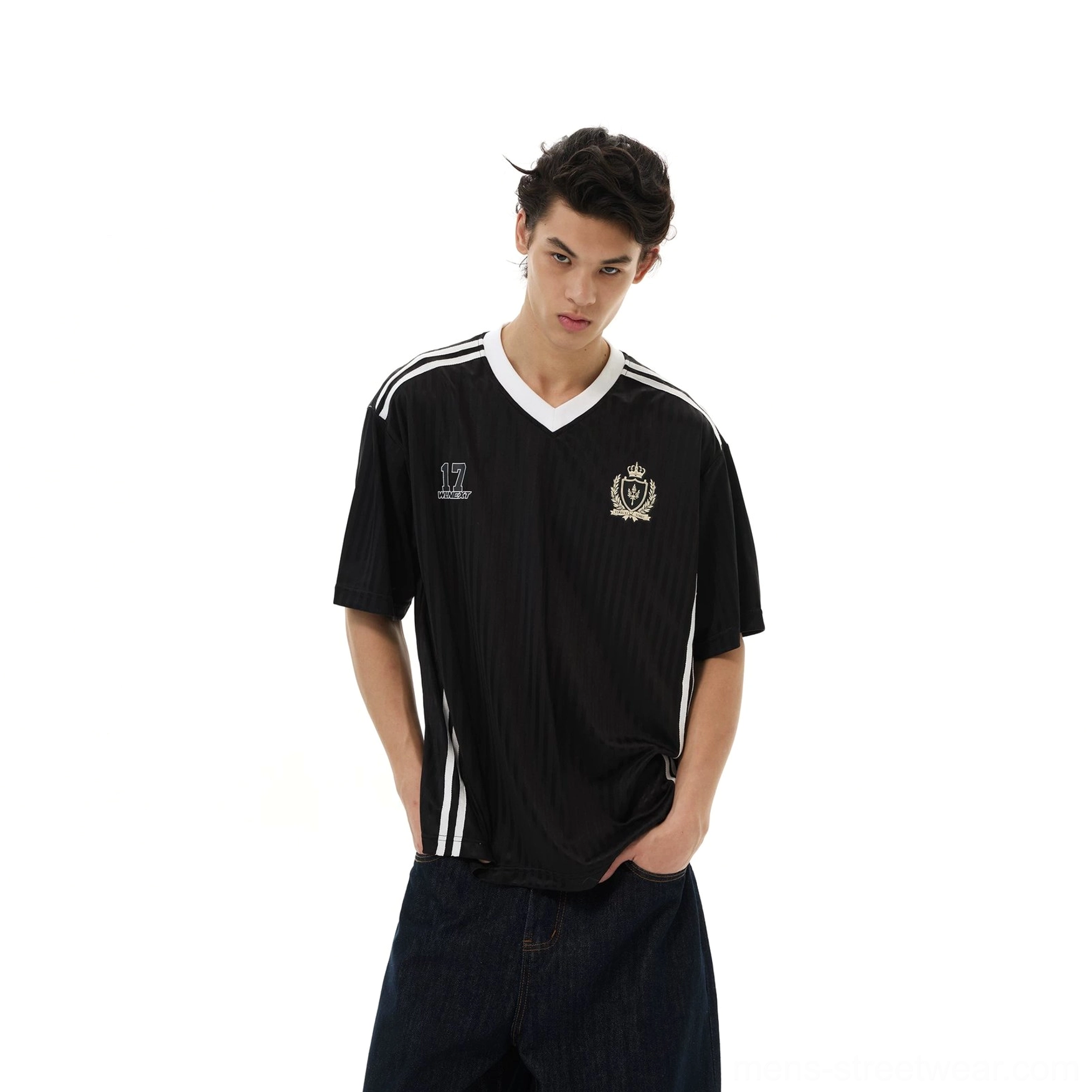 Black crested soccer jersey tee product image with V-neck collar, vertical pinstripes, athletic stripe details, and oversized fit