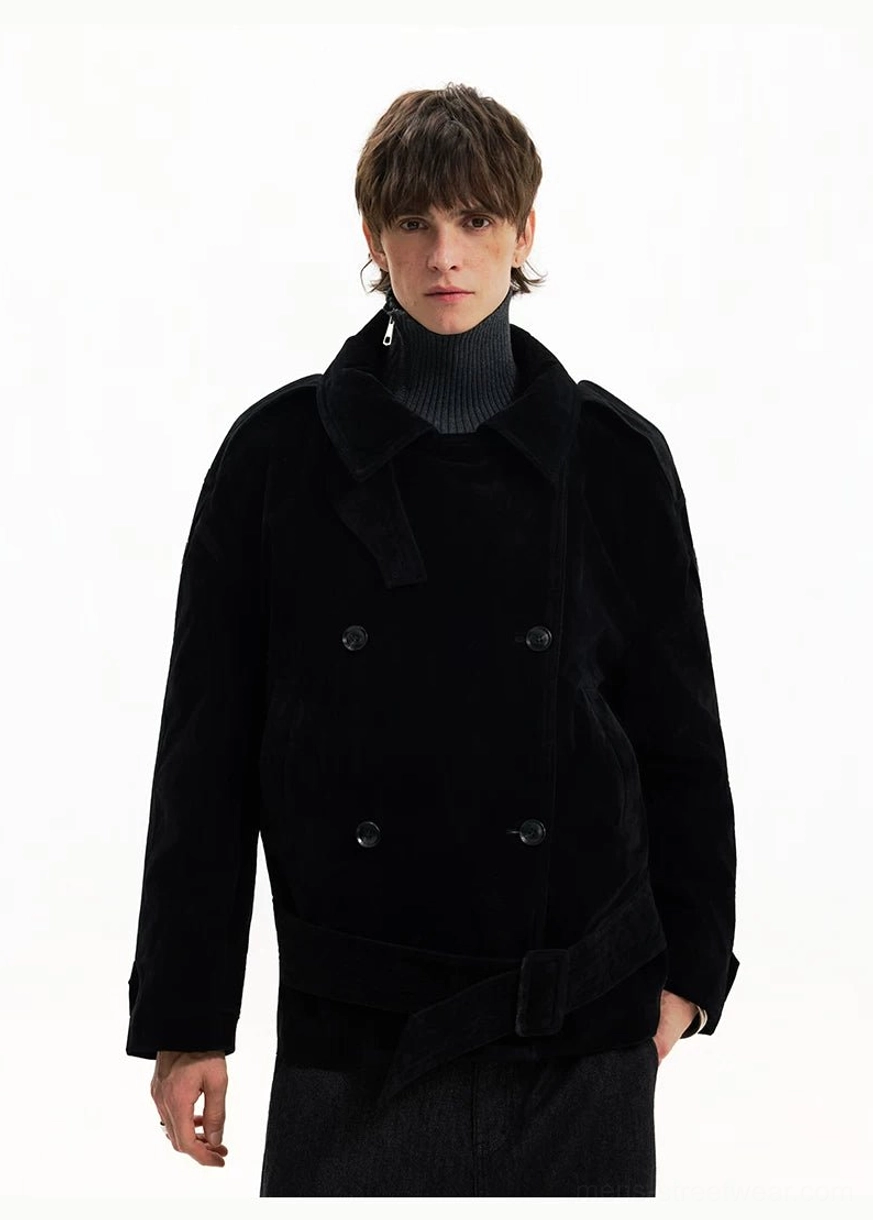 Black cropped double-breasted corduroy trench coat with open lapels and waist belt