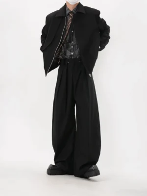 Side view of black cropped elastic hem blouson jacket in Korean minimalist streetwear styling