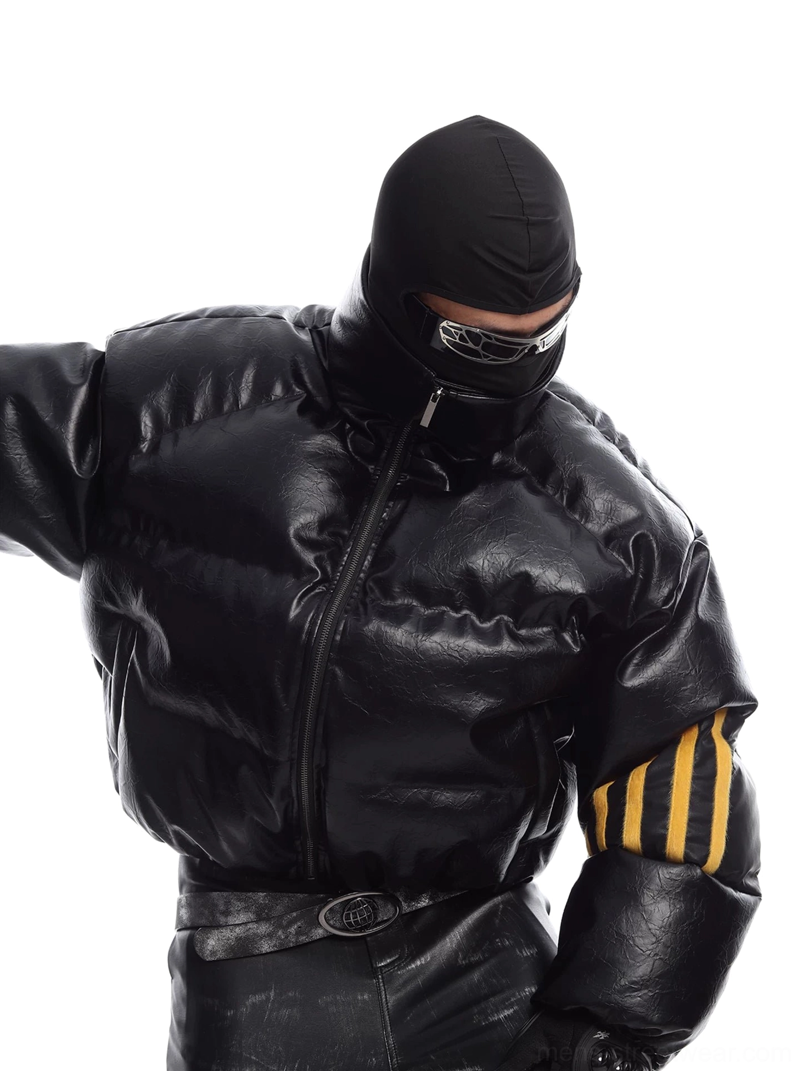Front close-up of black cropped PU leather puffer jacket with glossy finish, high stand collar, quilted padding, and yellow triple sleeve stripes styled in futuristic techwear streetwear