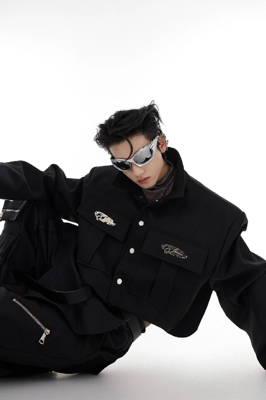 Black cropped shoulder pad cargo jacket styled with matching wide-leg cargo pants in futuristic Korean streetwear editorial