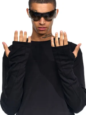 Front view of a fitted black men's cross-panel streetwear long-sleeve top with sculpted sleeves and thumbhole cuffs