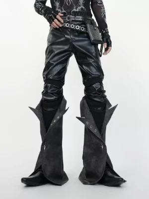 Front view of black cyber goth PU gaiter pants with flared boot cover panels, metal hardware, and punk streetwear styling