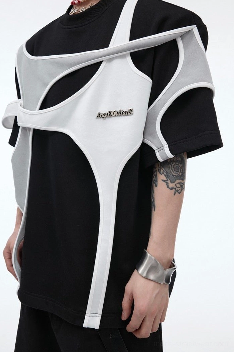 Close up of black deconstructed double layer oversized streetwear t-shirt with white grey layered straps and metal chest detail
