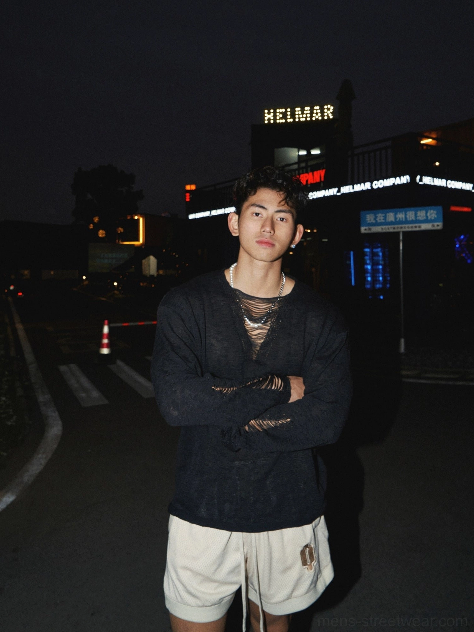 Black distressed lace-up long sleeve knit shirt with mesh-style neckline and relaxed Korean streetwear fit