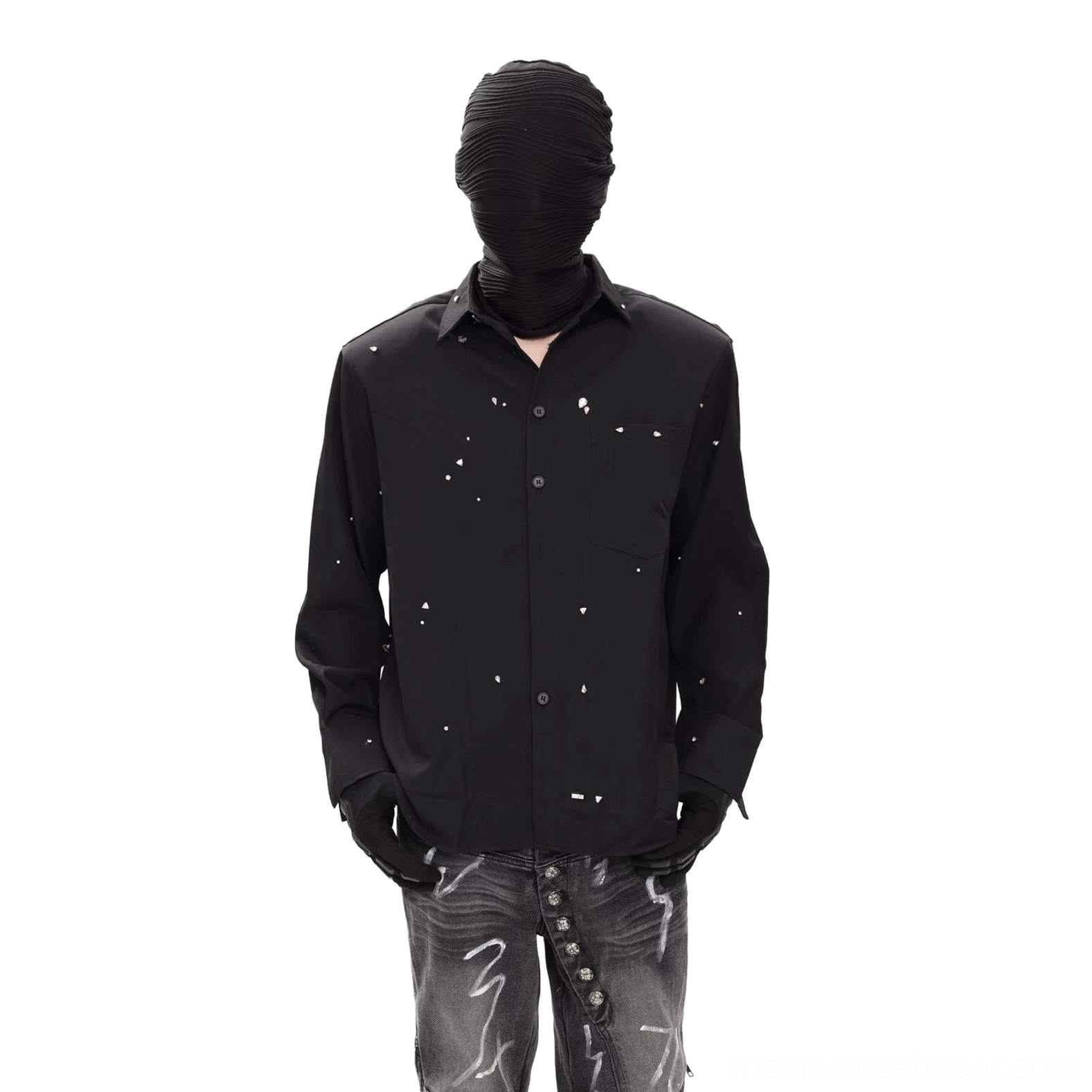 Front view of black distressed speckled shirt with chest pocket, button closure, relaxed silhouette, and graphic wide leg jeans