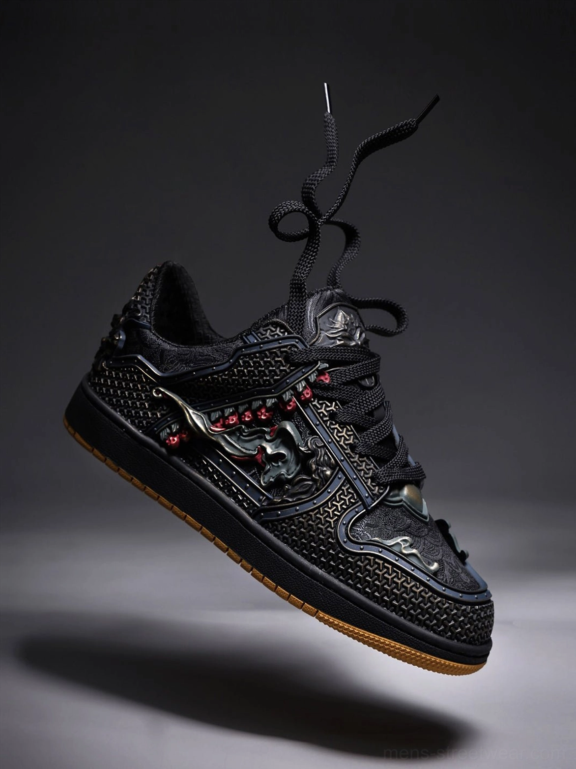 Black dragon embroidered low-top sneakers in a detailed streetwear product view with bronze and red decorative accents