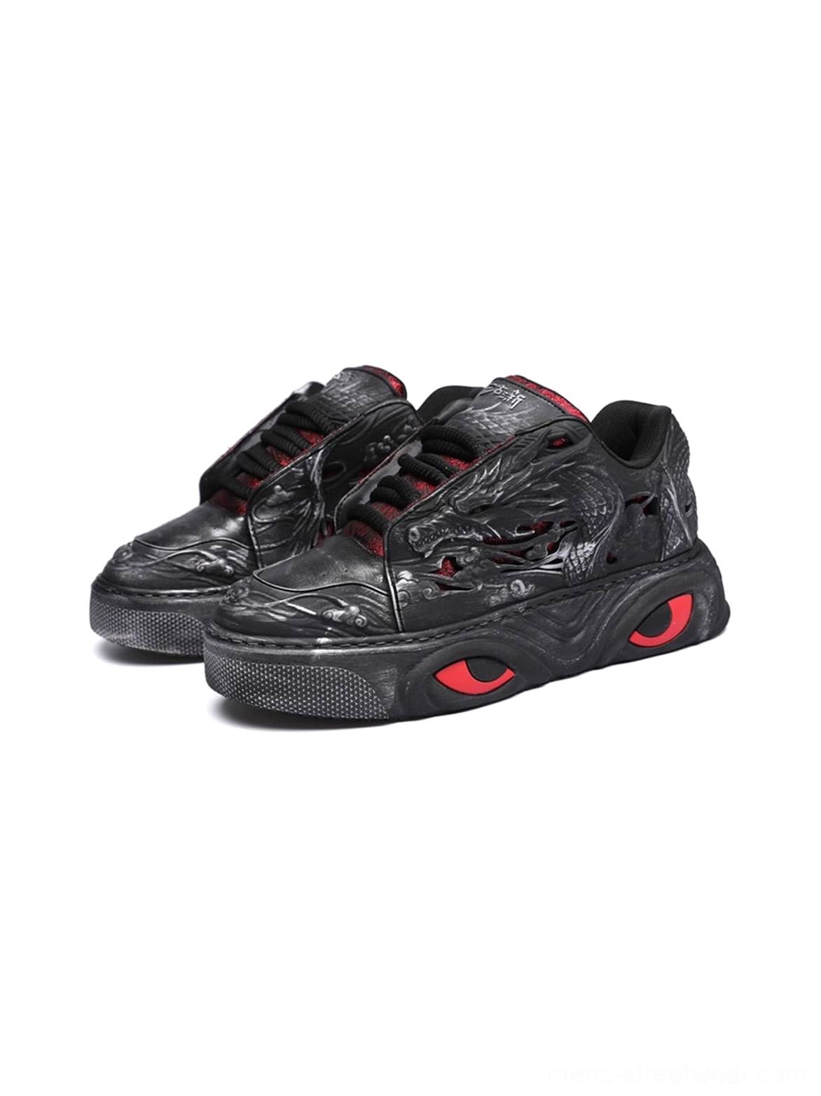 Black dragon relief chunky platform sneakers with red sole accents detailed product view