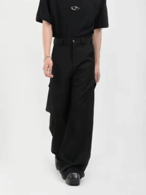 Black drape straight-leg trousers in a wide-leg tailored fit shown in walking three-quarter view