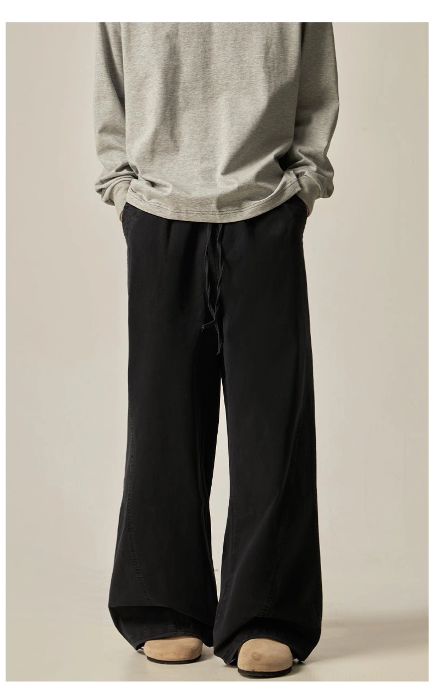 Black drawstring wide-leg pants detail shot waist elastic drawstring functional minimalist design comfortable versatile fit