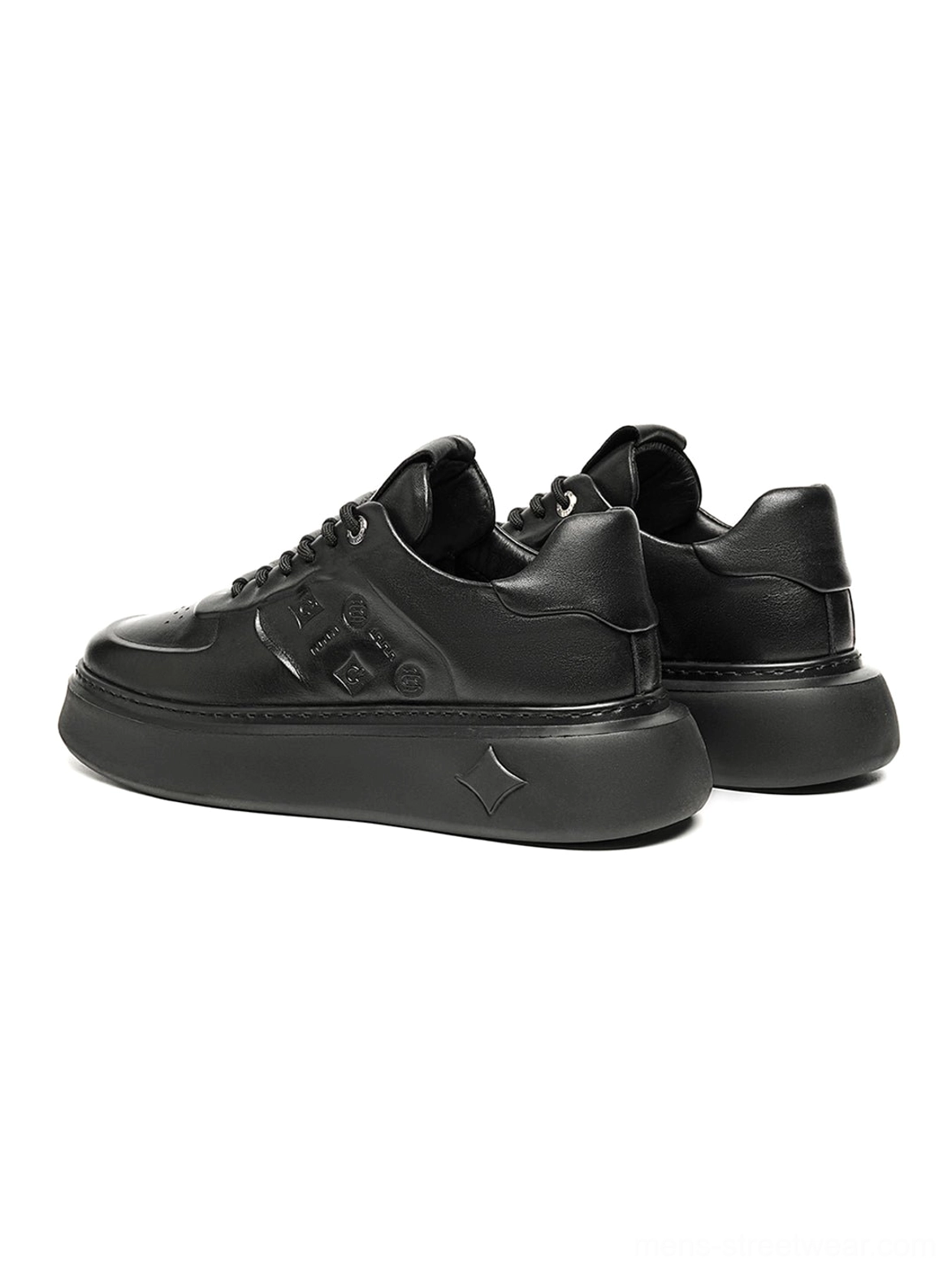 Black embossed leather-look platform sneakers with a thick sculpted sole for minimalist streetwear and everyday city wear