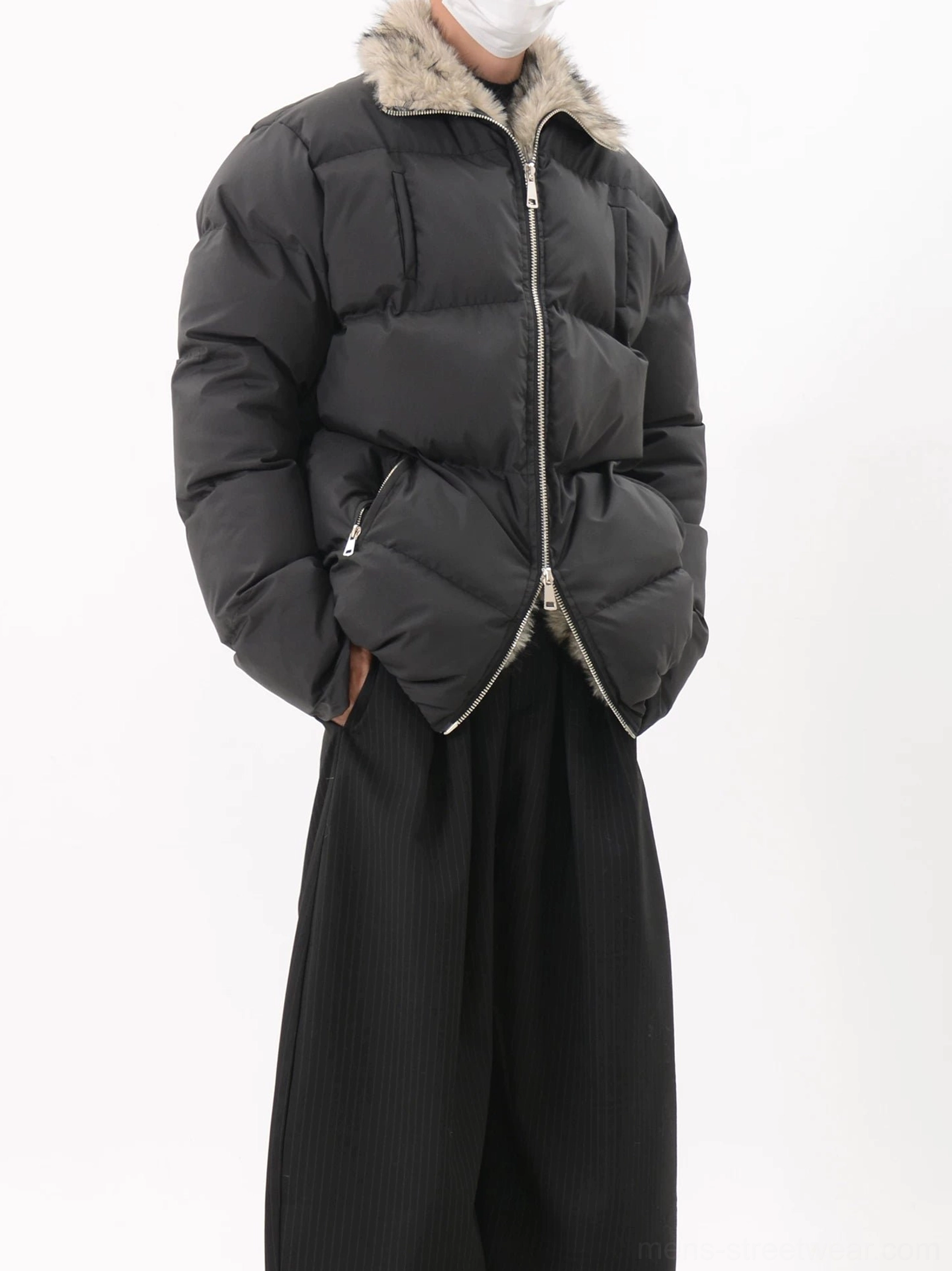 Black faux fur collar quilted puffer jacket shown partially unzipped with angled zip pockets and oversized Korean streetwear silhouette