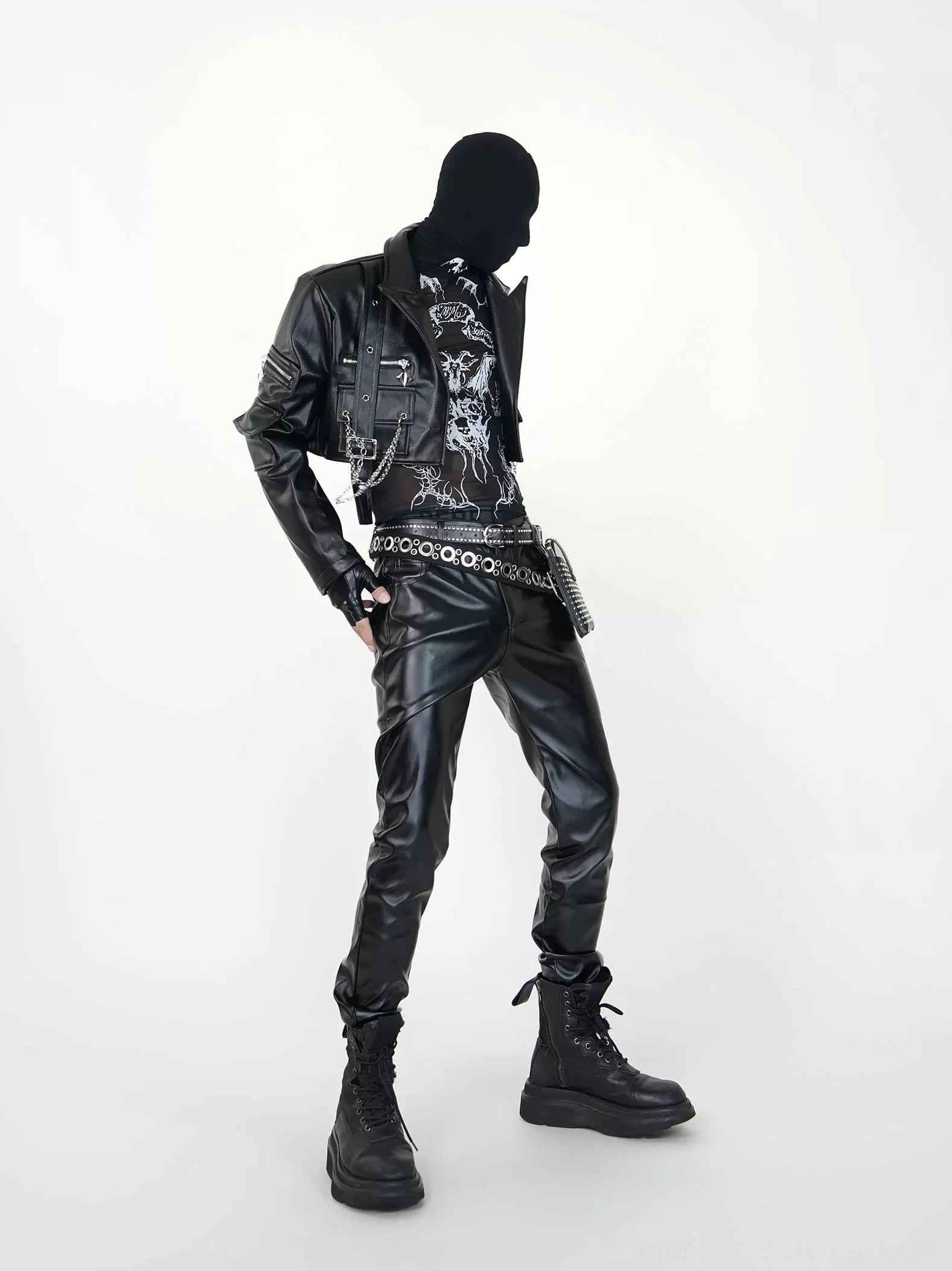 Right side view of black faux leather biker pants in a dark goth streetwear outfit with tailored slim profile