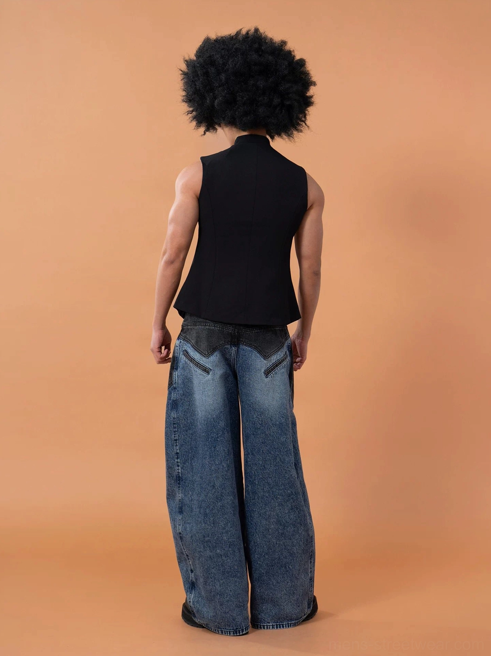 Full rear view of a black fitted mandarin collar waistcoat showing the clean back panel, tailored cut, and sleek minimalist silhouette