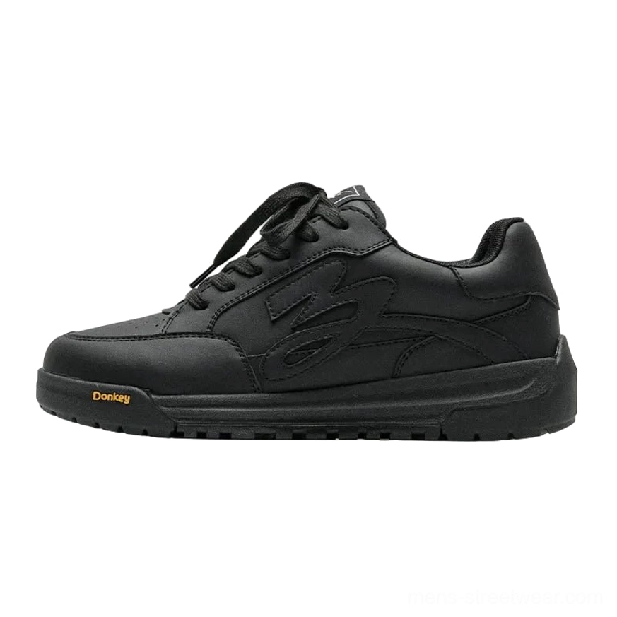 Black flame detail platform skate sneaker with low-top synthetic leather upper and black chunky traction sole