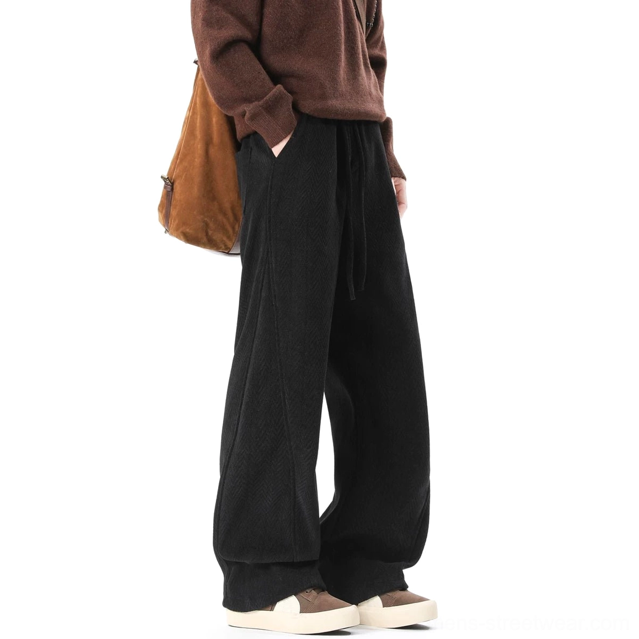 Black fleece-lined herringbone wide-leg lounge trousers side detail with relaxed draped leg and adjustable drawstring waist