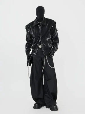Full cyberpunk streetwear outfit featuring a black glossy biker jacket, wide-leg trousers, double chains, and leather gloves