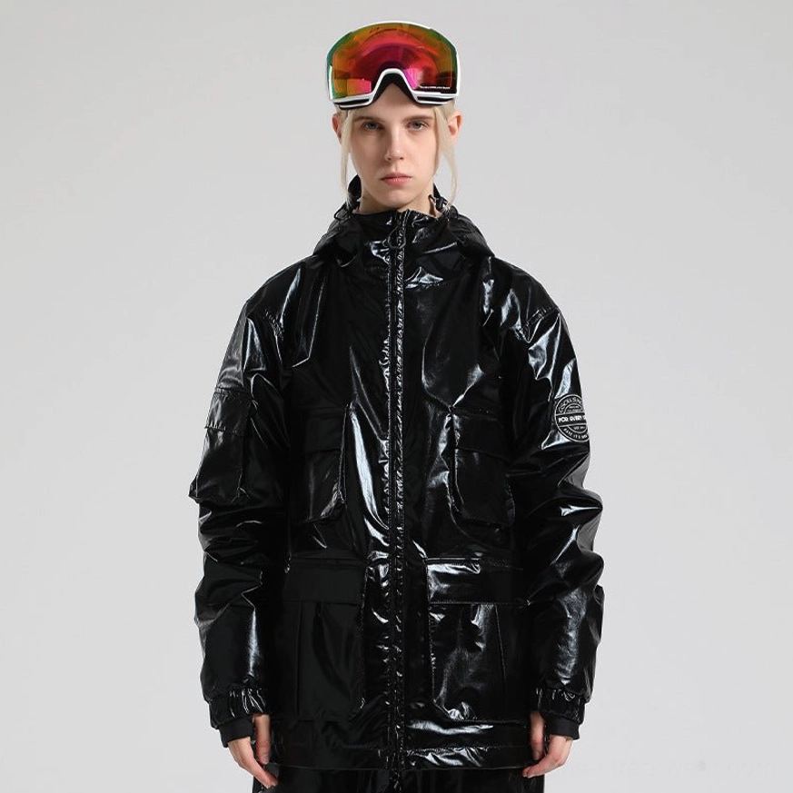 Black high-shine patent-style ski storm jacket with hood, multiple cargo pockets, embossed sleeve patch, and technical streetwear silhouette