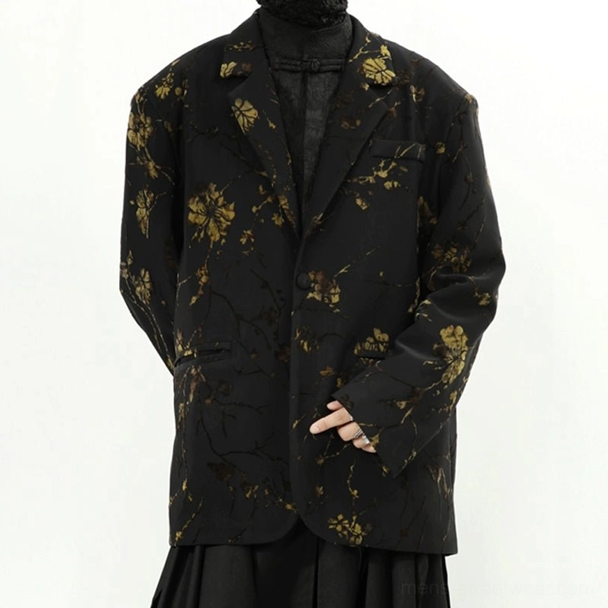 Black gold floral oversized blazer jacket angled front view with notched lapels and flap pockets