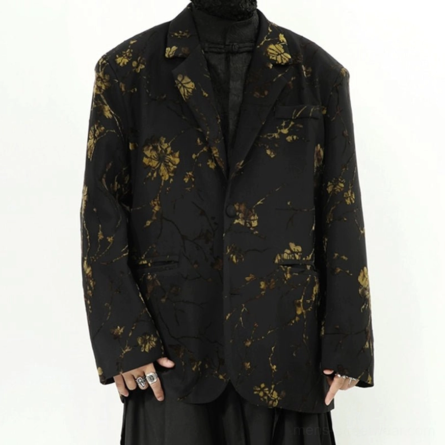 Black and gold floral print oversized blazer jacket front view in avant-garde streetwear styling