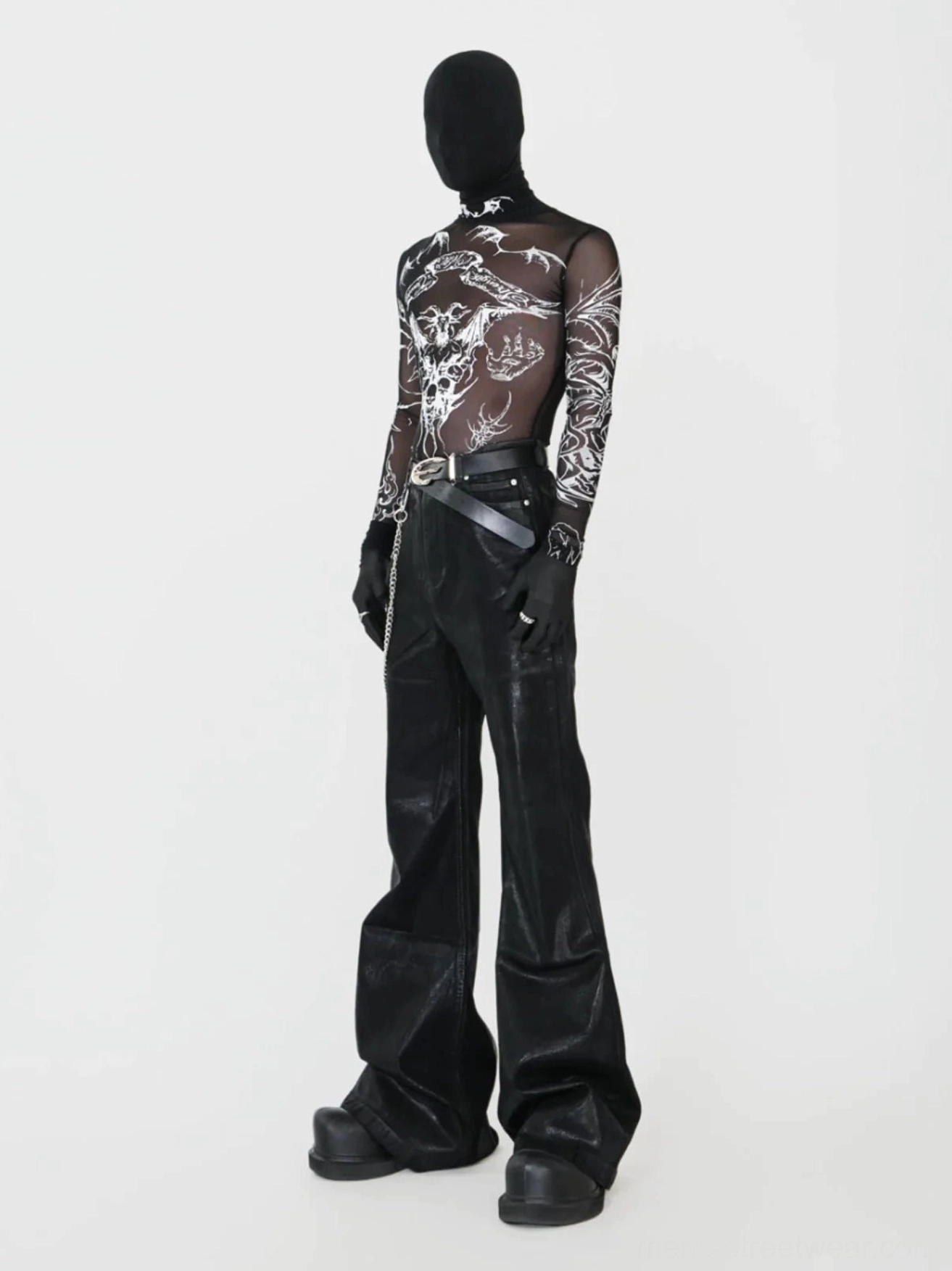 Side view of fitted black gothic tattoo mesh top with sheer fabric, detailed arm graphics, and avant-garde streetwear styling