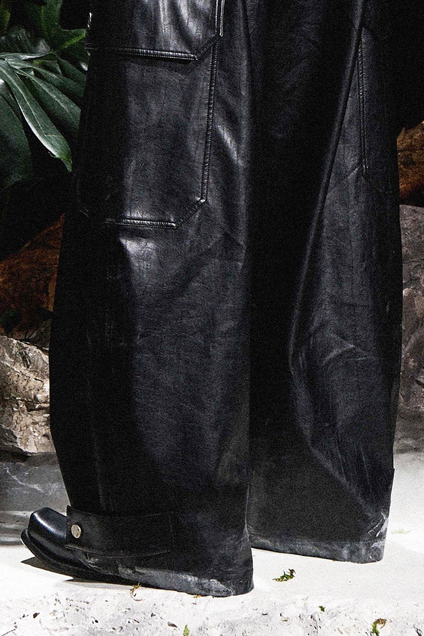 Black gothic wide-leg faux leather cargo pants product image with oversized streetwear silhouette and utility detailing