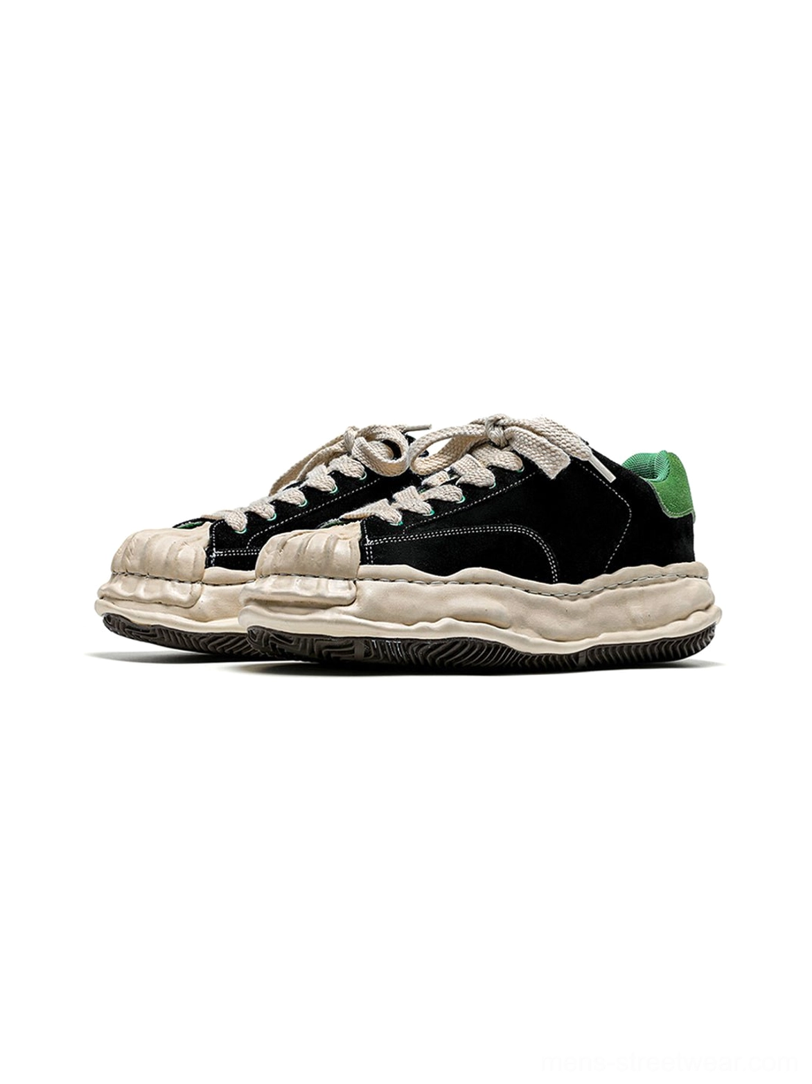Black and green shell-toe platform streetwear sneakers with chunky cream sole and retro-inspired lace-up design