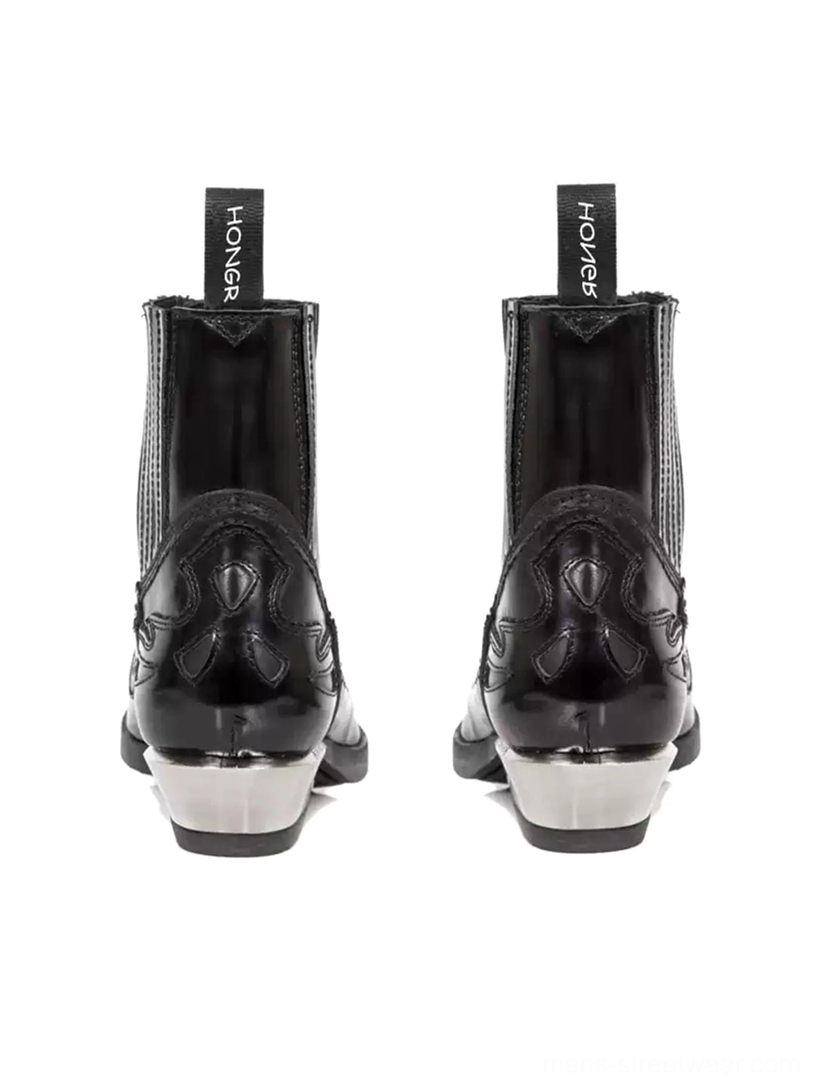 Rear view of black heeled Chelsea boots with Western-inspired back stitching and sculpted silver block heels