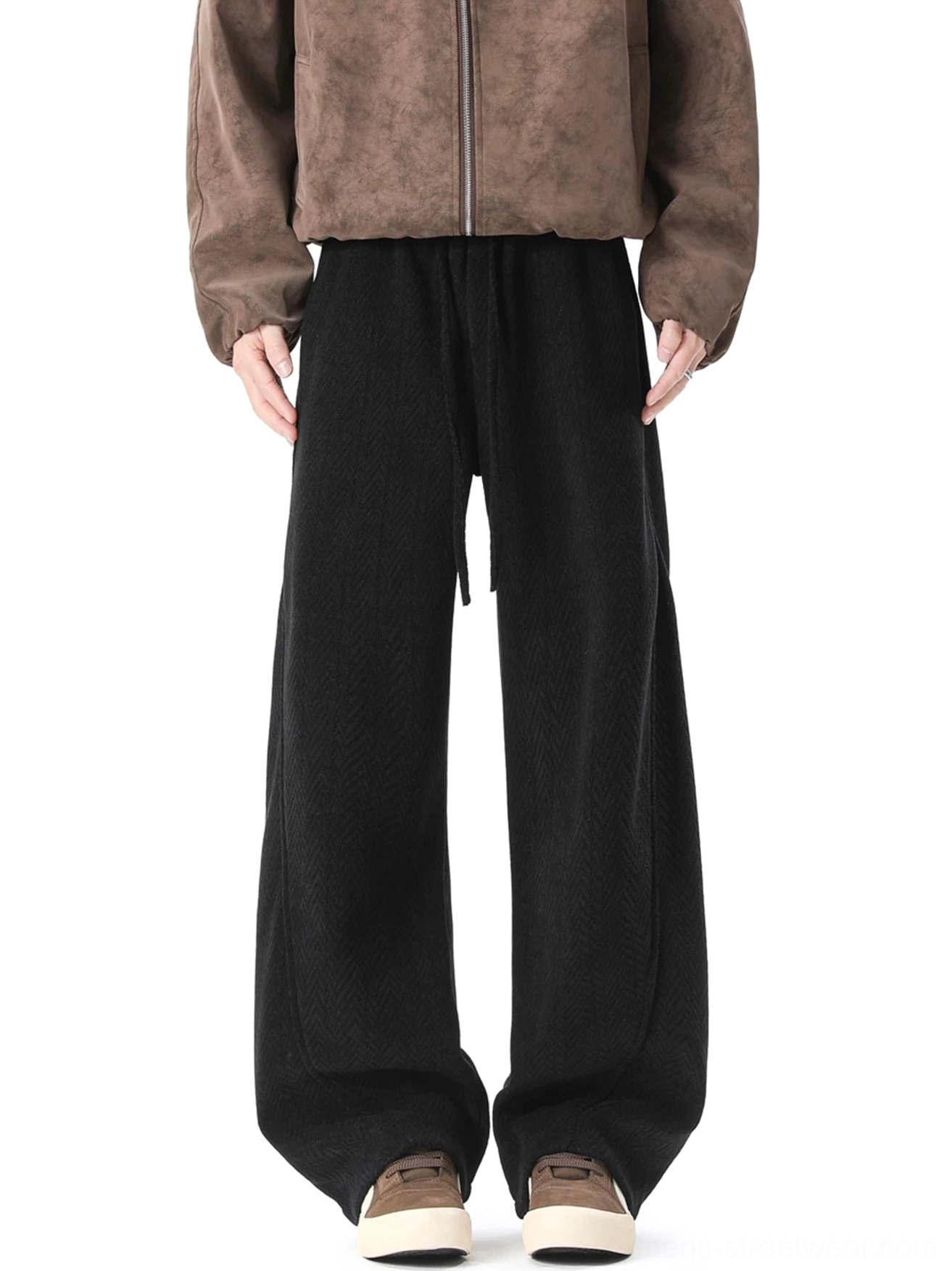 Black herringbone drawstring wide-leg lounge trousers in full front view styled with a brown suede zip jacket