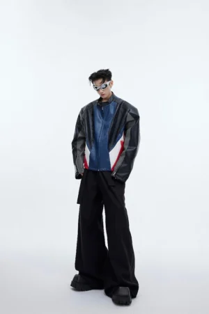 Black high-waist wide-leg tailored trousers in a Seoul streetwear outfit with color-block racing jacket and sunglasses