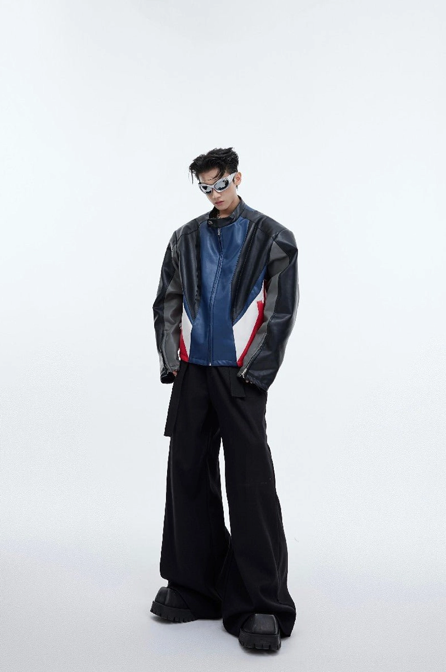 Black high-waist wide-leg tailored trousers in a Seoul streetwear outfit with color-block racing jacket and sunglasses