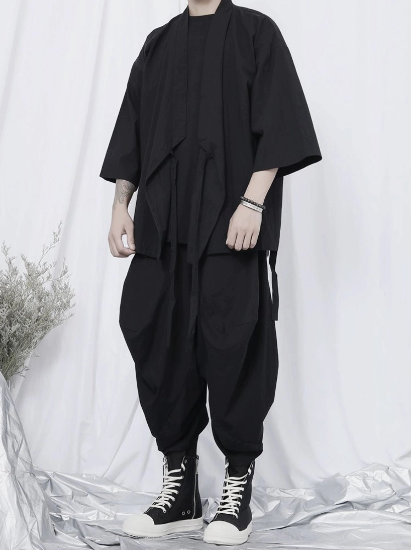 Black Korean streetwear kimono shirt with relaxed fit and minimalist monochrome design for layered urban outfits