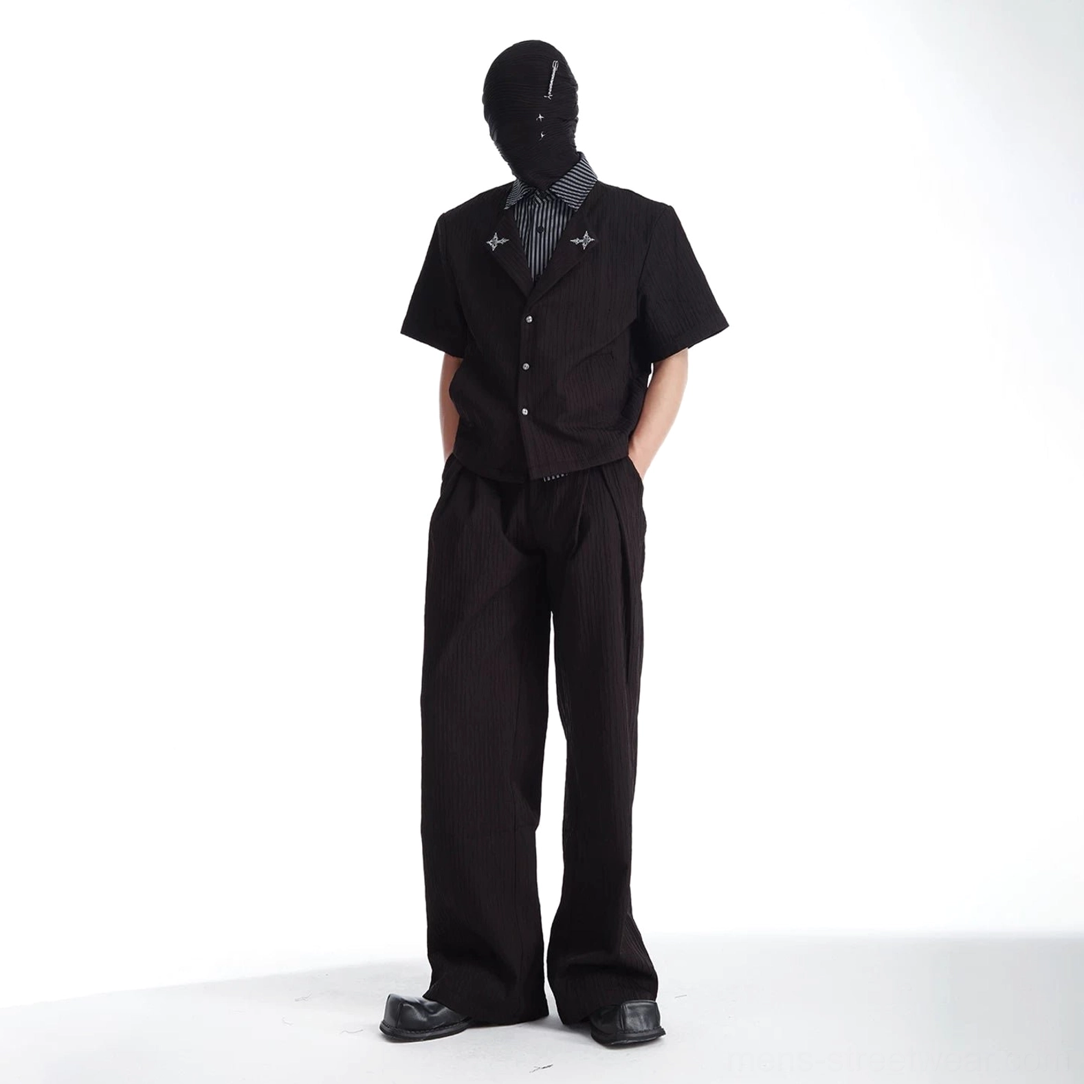 Black Korean streetwear outfit with cropped layered short-sleeve shirt high-waisted wide-leg trousers and matching stripes