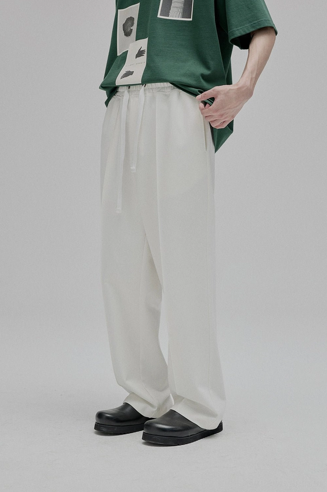Black lace-up straight leg trousers full silhouette length styling minimalist Korean inspired streetwear