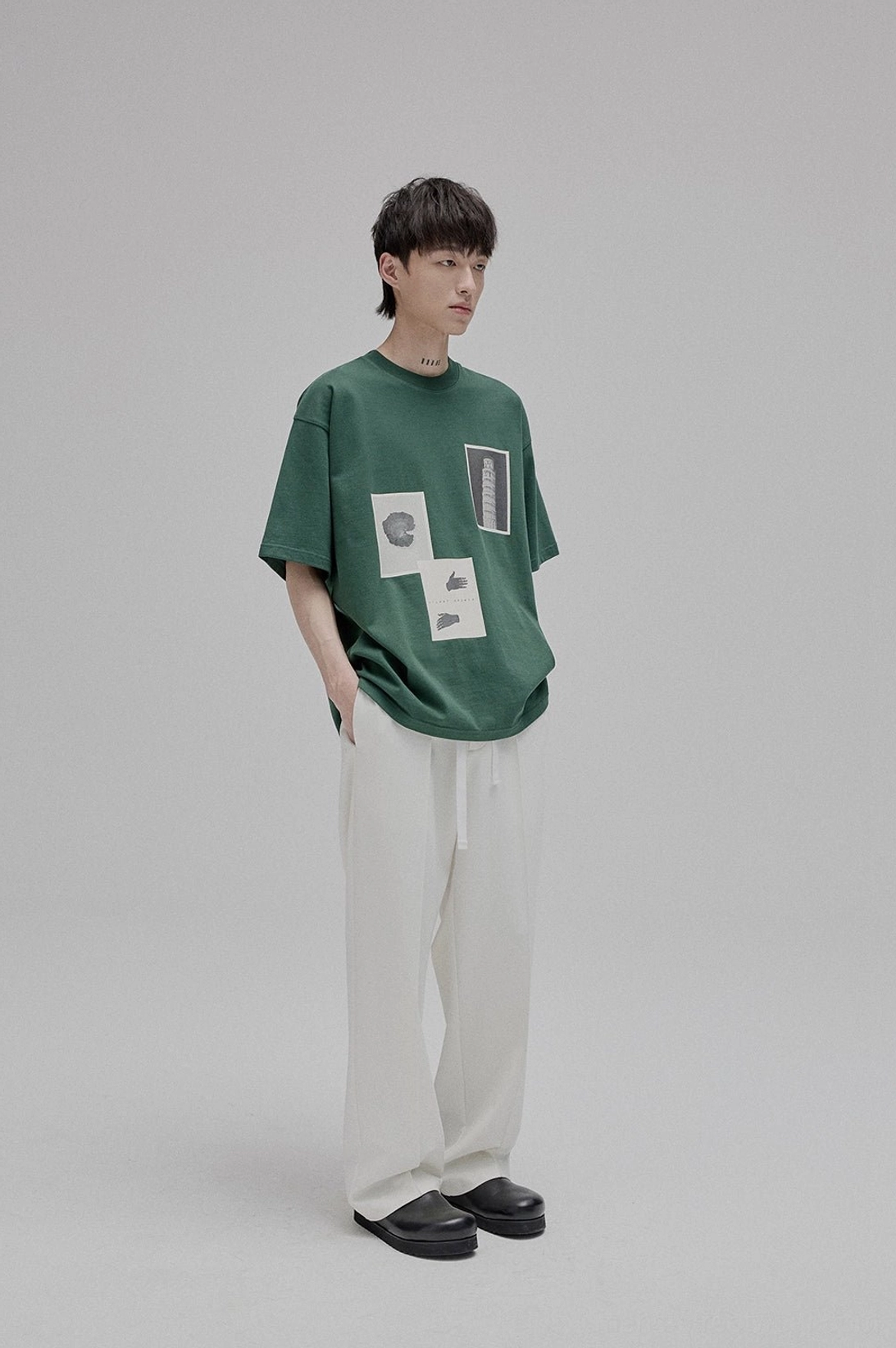 Black lace-up straight leg trousers worn outfit styling streetwear casual pants minimalist aesthetic
