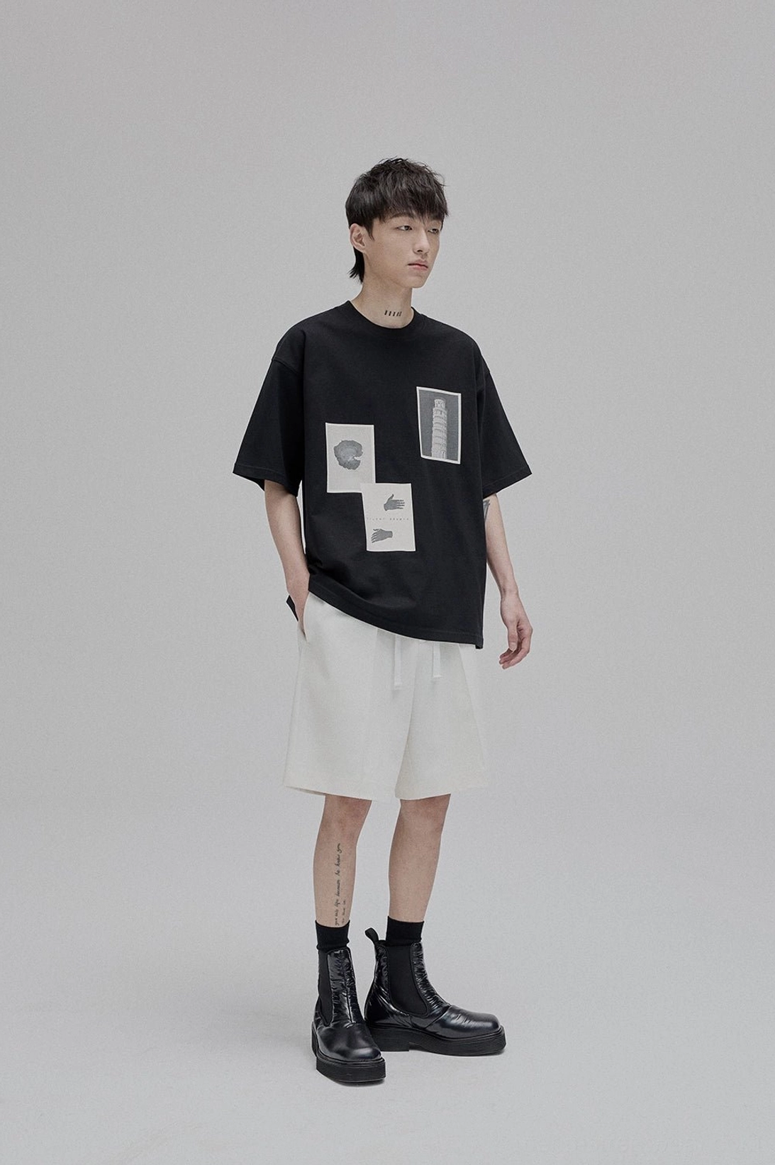 Black lace-up straight leg tapered trousers detailed view minimalist streetwear Korean inspired styling