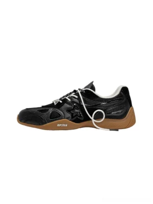 Black layered retro runner sneaker shown in left side profile with mesh panels, leather overlays, white drawcord laces, and gum rubber outsole