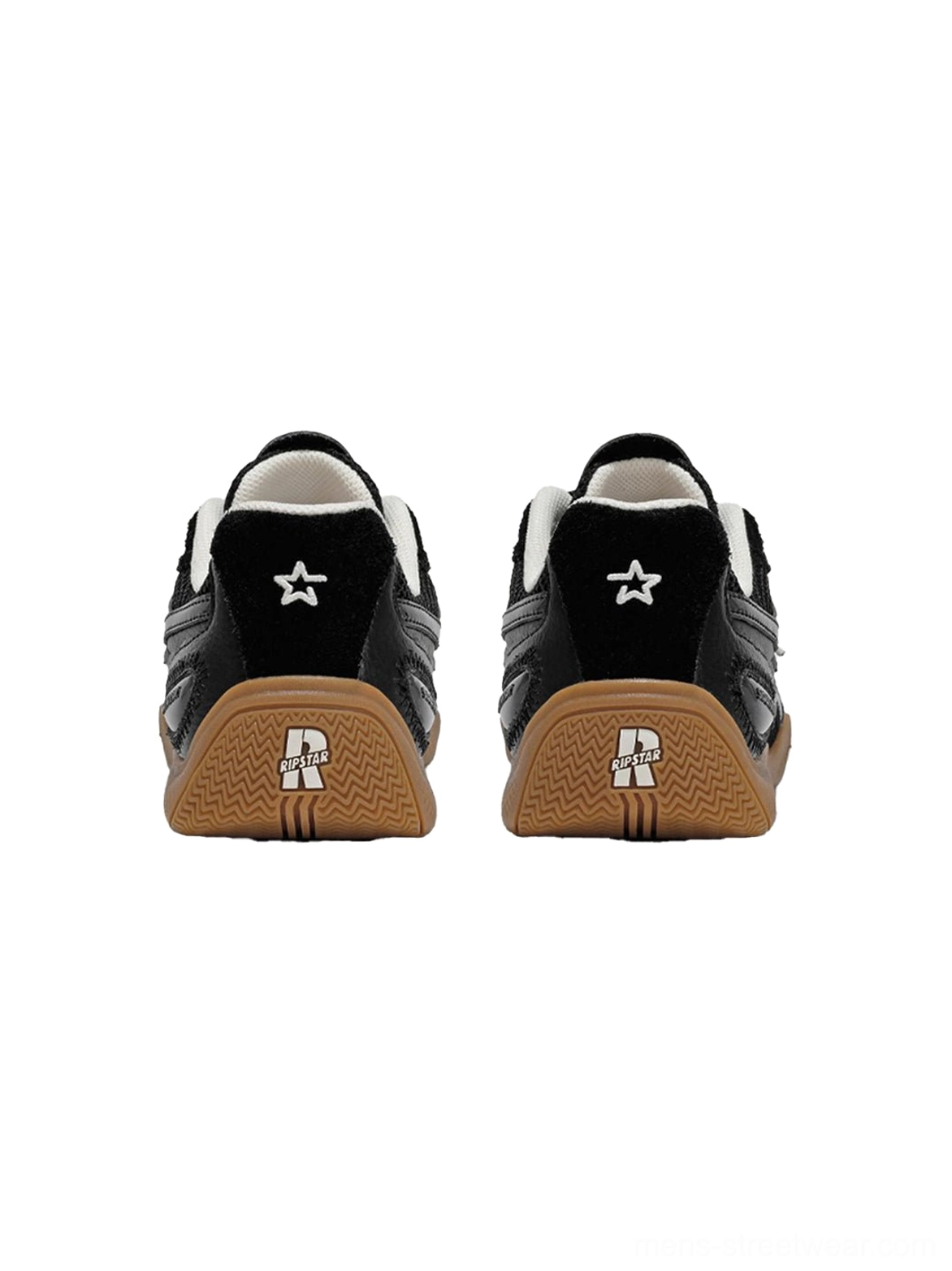 Rear top-down view of black layered runner sneakers showing star heel detailing, structured heel tabs, and gum outsole edges